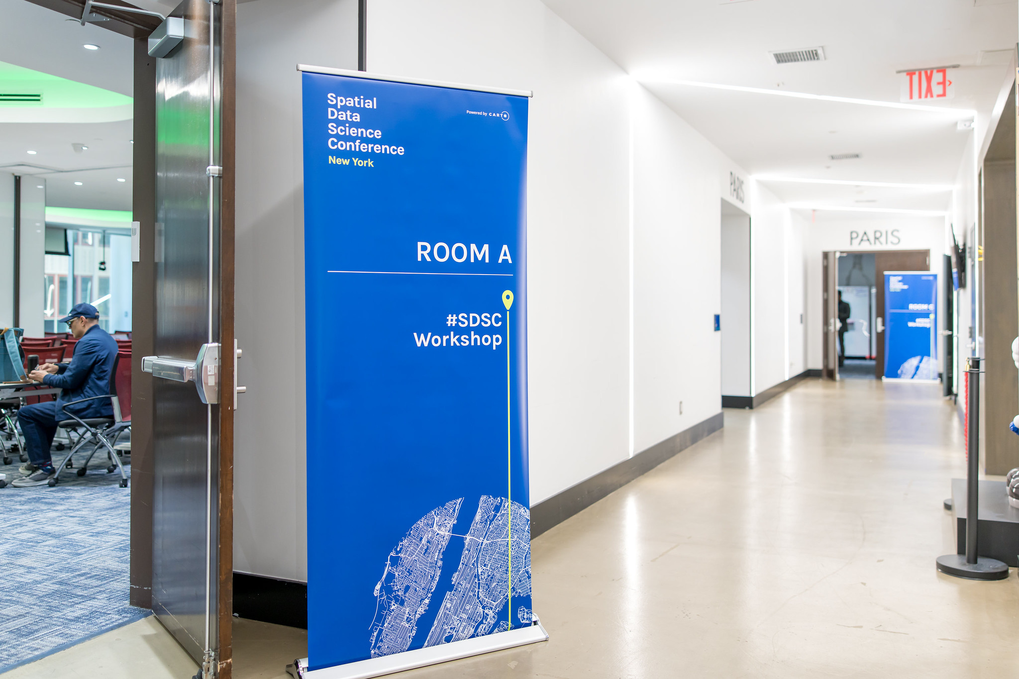Physical room wayfinding banner for the Spatial Data Science Conference